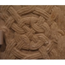 Intertwined loops forming a cross